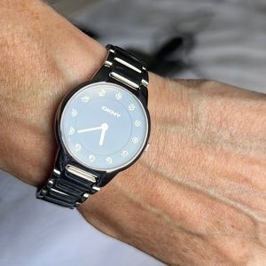 Silver and black DNKY ladies watch.